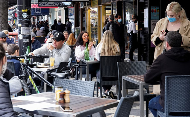Australia's Melbourne Back To The Races, Shops As Vaccination Rate Hits 80%