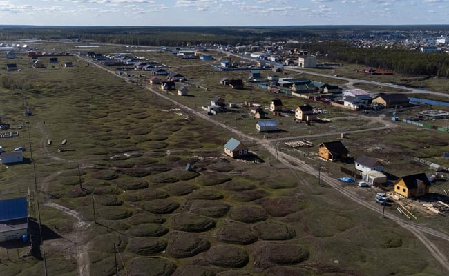 Russia's Remote Permafrost Thaws, Threatening Homes, Alarms Scientists