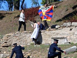 Activists Unfurl Tibet Flag At Beijing Olympics Flame Ceremony