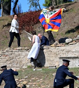 Activists Unfurl Tibet Flag At Beijing Olympics Flame Ceremony