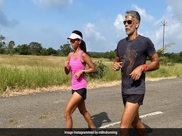 Wondering Who Takes Pics Of Milind Soman And Ankita Konwar Running? The Answer Here Wondering Who Takes Pics Of Milind Soman And Ankita Konwar Running? The Answer Here