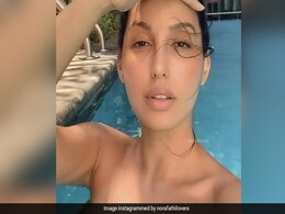 नोरा फतेही का पूल वीडियो वायरल, एक्ट्रेस का अंदाज देख फैंस के यूं आए रिएक्शन नोरा फतेही का पूल वीडियो वायरल, एक्ट्रेस का अंदाज देख फैंस के यूं आए रिएक्शन