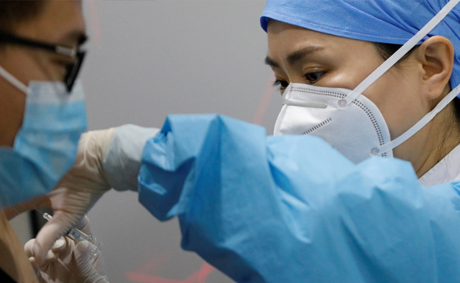 Chinese City Mandates Covid Vaccine Booster Shots For Some Workers