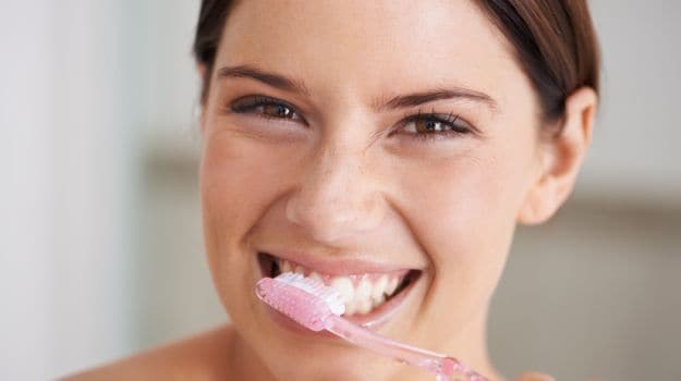 Are You Brushing Wrong? Dentist Shares The Right Method, Brush Type, More