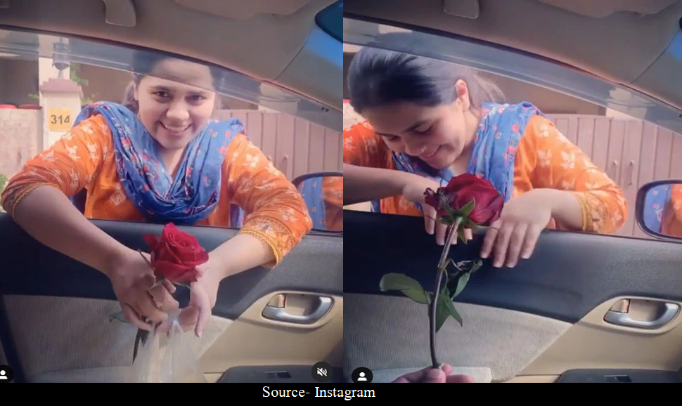 पति ने पत्नी को दिया गुलाब का फूल, शर्माकर पत्नी ने कहा- प्यार का नशा चढ़ा हुआ है