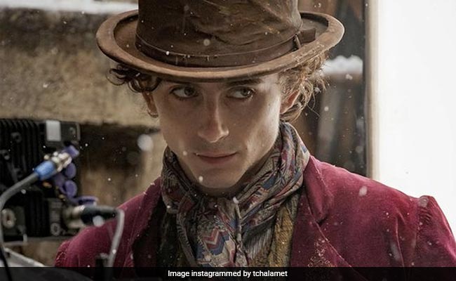 In Willy Wonka's Trademark Purple Coat And Top Hat, Timothee Chalamet Looks Phenomenal