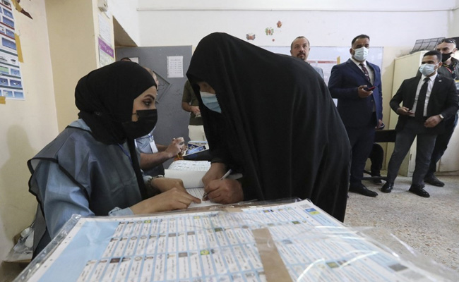 Iraqis Begin Voting In Early Election, Many Expected To Boycott Amid Distrust
