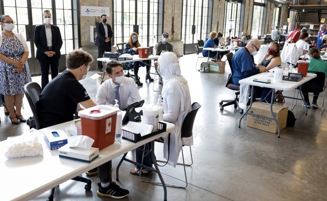 Nighttime Curfew, New Year Gathering Limits In Canada As Covid Cases Soar