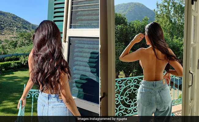 All Esha Gupta Needs To Enjoy A Day Spent Sunbathing Is A Pair Of Baggy Jeans