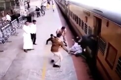 Woman Falls Trying To Deboard From Moving Train, Gets Dragged, Saved By Cop Woman Falls Trying To Deboard From Moving Train, Gets Dragged, Saved By Cop