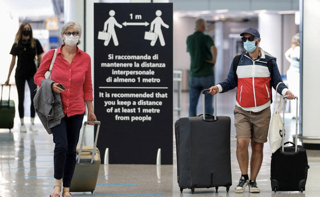 Travel Curbs, Plunging Markets Lead To Global Panic Over New Covid Strain
