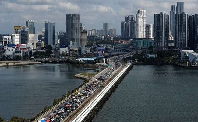 Singapore, Malaysia Reopen Land Border As New Variant Concern Grows