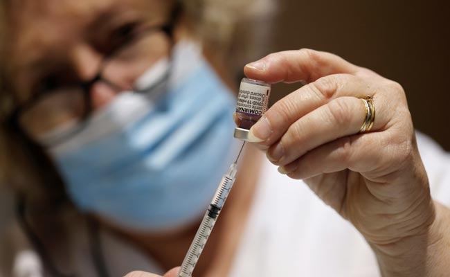 Omicron May Elude Current Vaccines, Says Moderna Expert