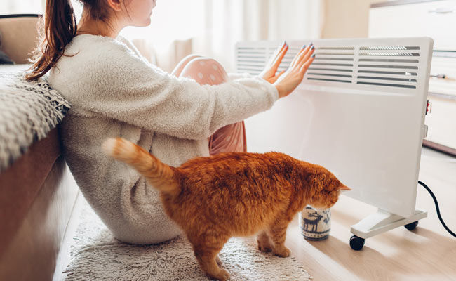 Utilise a thermostat or timer feature if available on the room heater