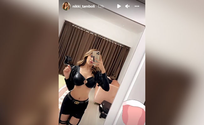 In A Crop Top And Ripped Jeans, Nikki Tamboli Has All Eyes On Her Trendy Black Outfit