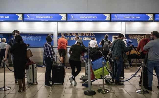 Tourists Rush To South Africa Airport After Travel Bans Over New Covid Strain
