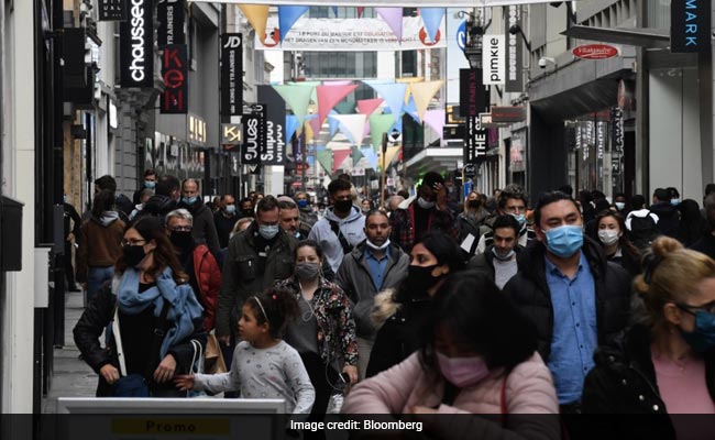 Masks Cut Covid Risk In Half, New Study Shows