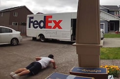 Delivery Guy Does Push-Ups in Driveway Delivery Guy Does Push-Ups in Driveway