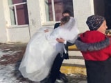 Video: Slippery Steps Send Bride And Groom To The Ground