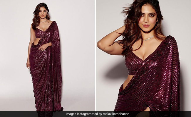 Malavika Mohanan Is A <i>Desi</i> Girl Personified In A Sequinned Wine Coloured <i>Saree</i>