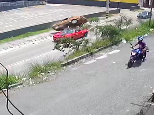 Man Drives Car Off Road, Lands On Another Vehicle