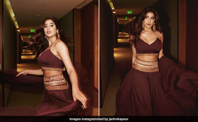Janhvi Kapoor Twirls To Chic New Heights In A Stunning Maroon <i>Lehenga</i>