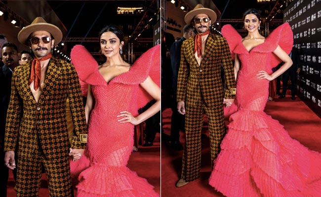 Ranveer Singh's Gucci Suit And Deepika Padukone's Red Gown Showcase Their Contrasting Red Carpet Style