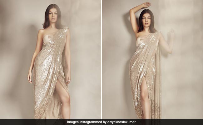 Divya Khosla Kumar Shimmers Away Brighter Than A Chandelier In A Golden Sequinned <i>Saree</i>
