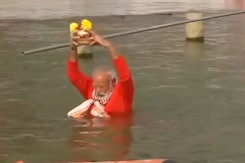PM Prays In Varanasi, Takes A Dip In River Ganga PM Prays In Varanasi, Takes A Dip In River Ganga