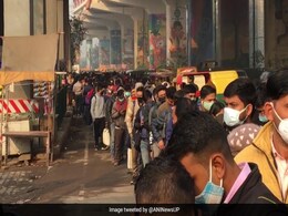 Pics: Long Delhi Queues For Metro, Buses As New Curbs Begin Pics: Long Delhi Queues For Metro, Buses As New Curbs Begin