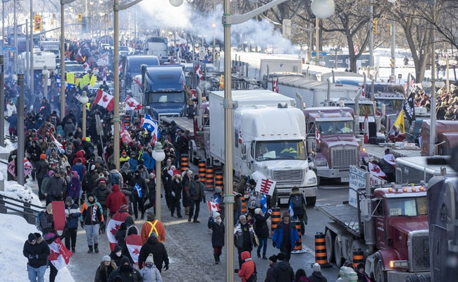Thousands Block Roads, Chant Slogans In Canada "Freedom Convoy" Protest