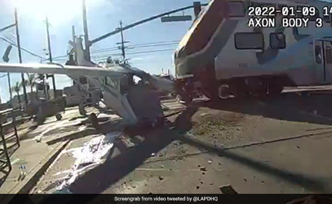 Dramatic Video Shows Train Crashing Into Plane Just Seconds After Pilot Is Rescued