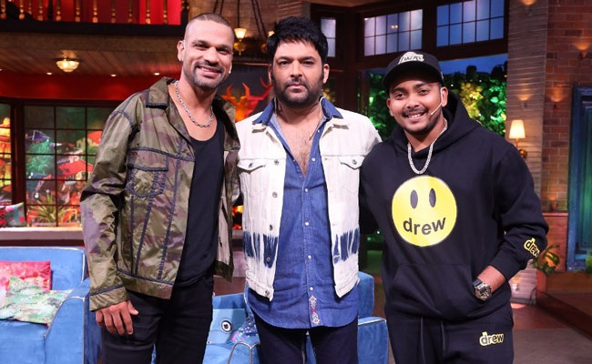 The Kapil Sharma Show में बांसुरी बजाएंगे शिखर धवन, रैप करेंगे पृथ्वी शॉ