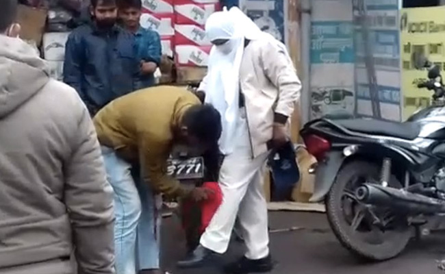 Video: Madhya Pradesh Policewoman Forces Man To Clean Her Trousers