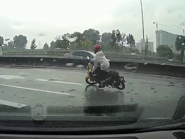 Narrow Escape For Motorcyclist After Crashing On Highway