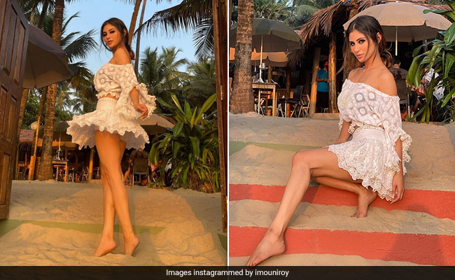 Mouni Roy's Breezy Beach Style Is Complete With A White Ruffled Skirt And Top