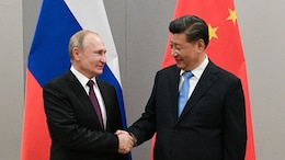 In Xi Jinping's New Year Message To Russia's Putin, A Vow To Promote 'World Peace'
