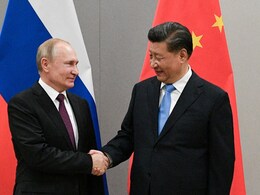 In Xi Jinping's New Year Message To Russia's Putin, A Vow To Promote 'World Peace'