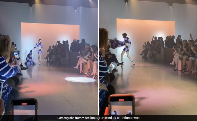 Watch: Model Hits Audience Member With Her Coat In Bizarre Video