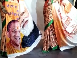 UP Polls Theme Sarees With PM, Yogi Adityanath Pics UP Polls Theme Sarees With PM, Yogi Adityanath Pics