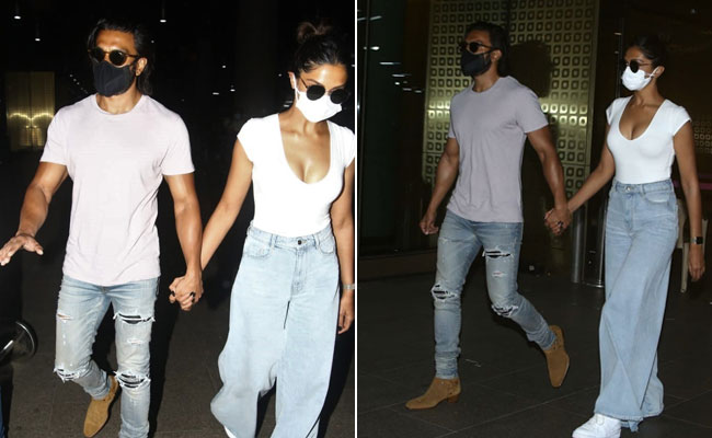 Ranveer Singh And Deepika Padukone Are Back In Mumbai With Matching Jeans, Tees And Tans