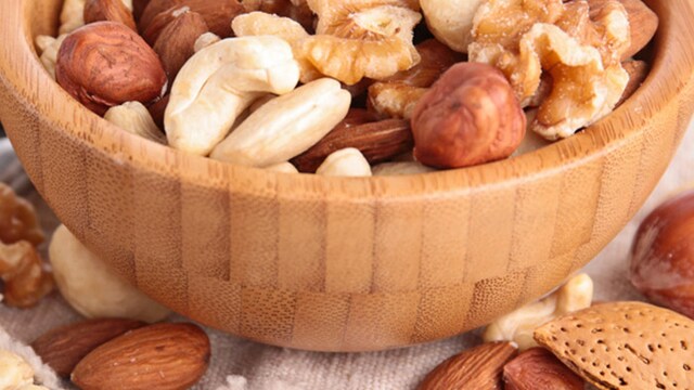 Nuts may be a better alternative to unhealthy snacks you may be craving during periods