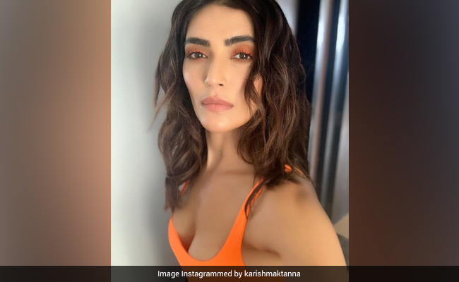 Karishma Tanna Sets Casual Wearing Straight With Vibrant Orange-Blue Combo