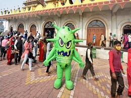 Drone Sprays Water On Devotees During Bengal's Gangasagar Mela Amid Covid Drone Sprays Water On Devotees During Bengal's Gangasagar Mela Amid Covid