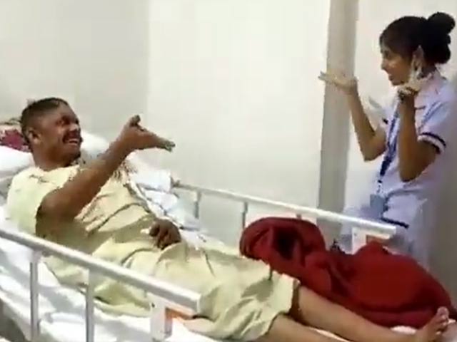Nurse Dances With Patient For Physiotherapy