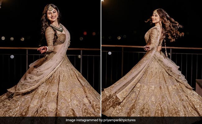 Mouni Roy Surely Got Her New Bridal Glow From Her Golden <i>Sangeet Lehenga</i>