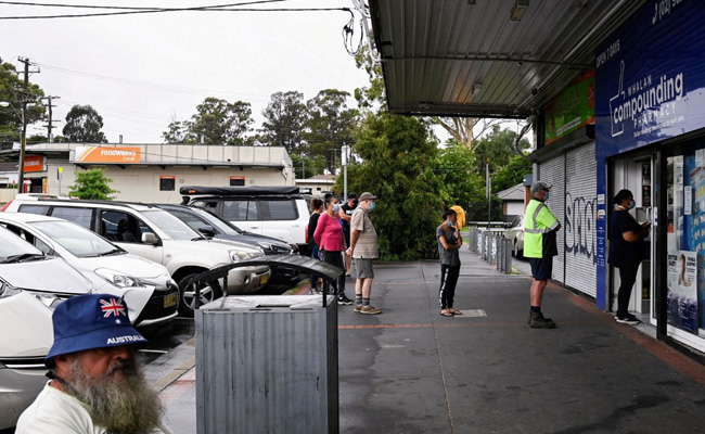 Australia Swamped By Omicron Surge As Pressure Grows On Hospitals