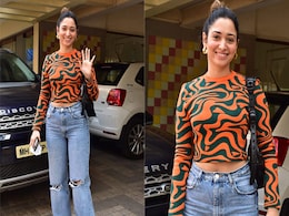 Tamannaah Bhatia Makes A Ripple Effect With Her Vibrant Orange Sweater Tamannaah Bhatia Makes A Ripple Effect With Her Vibrant Orange Sweater