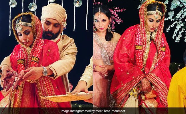 Mouni Roy Is A Beautiful Bengali Bride In A Red Sabyasachi <i>Lehenga</i>