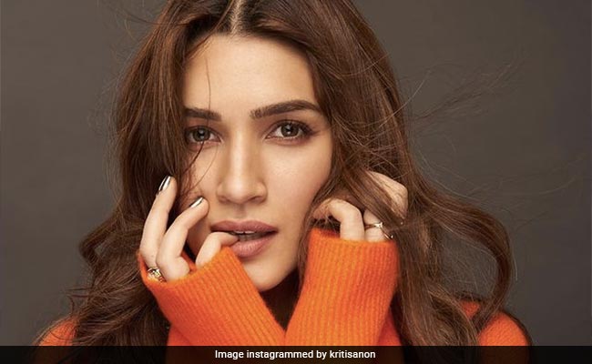 Shine As Bright As Kriti Sanon In A Bright Orange Sweater This Winter